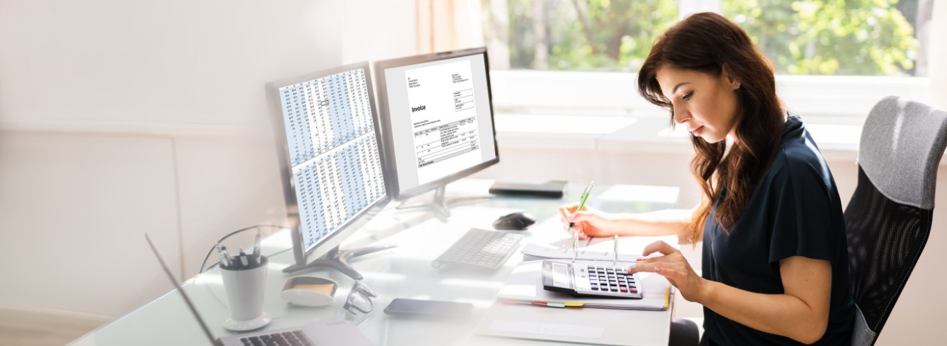 Why Prepare for Tax Season Mid-Year Copy a woman sitting at a desk with a laptop and a laptop
