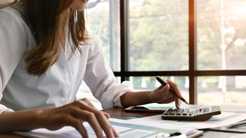 business woman with calculator